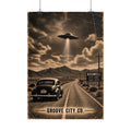 Vintage Roswell UFO poster with classic car on desert highway and Groove City Co. design