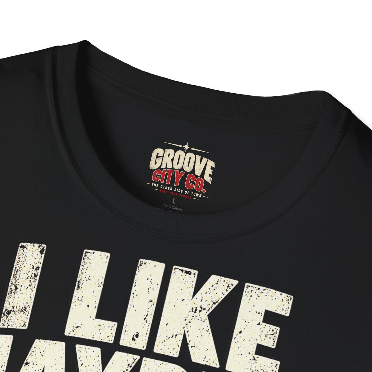 Groove City Co. branded inner neck label on black T-shirt.