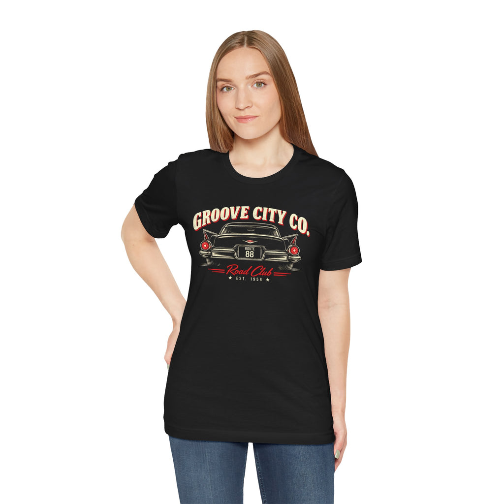 Woman wearing a black Groove City Road Club Route 88 vintage car T-shirt
