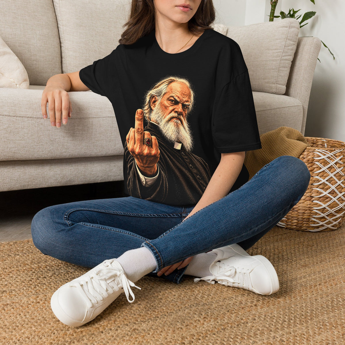 Woman wearing the Holy Attitude black unisex T-shirt with vintage rebel priest graphic by Groove City Co.
